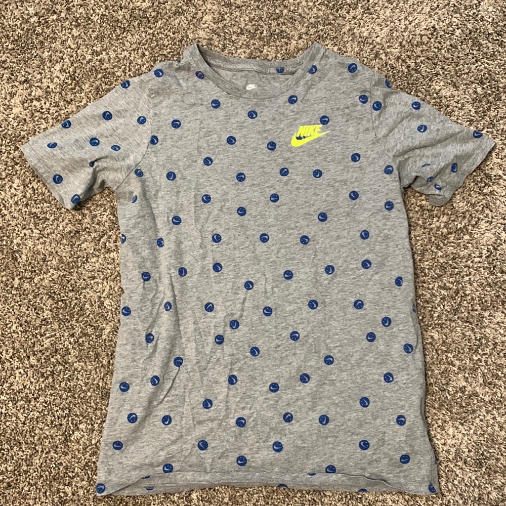 Grey Nike shirt. Great condition. Can be worn casually and semi nice.